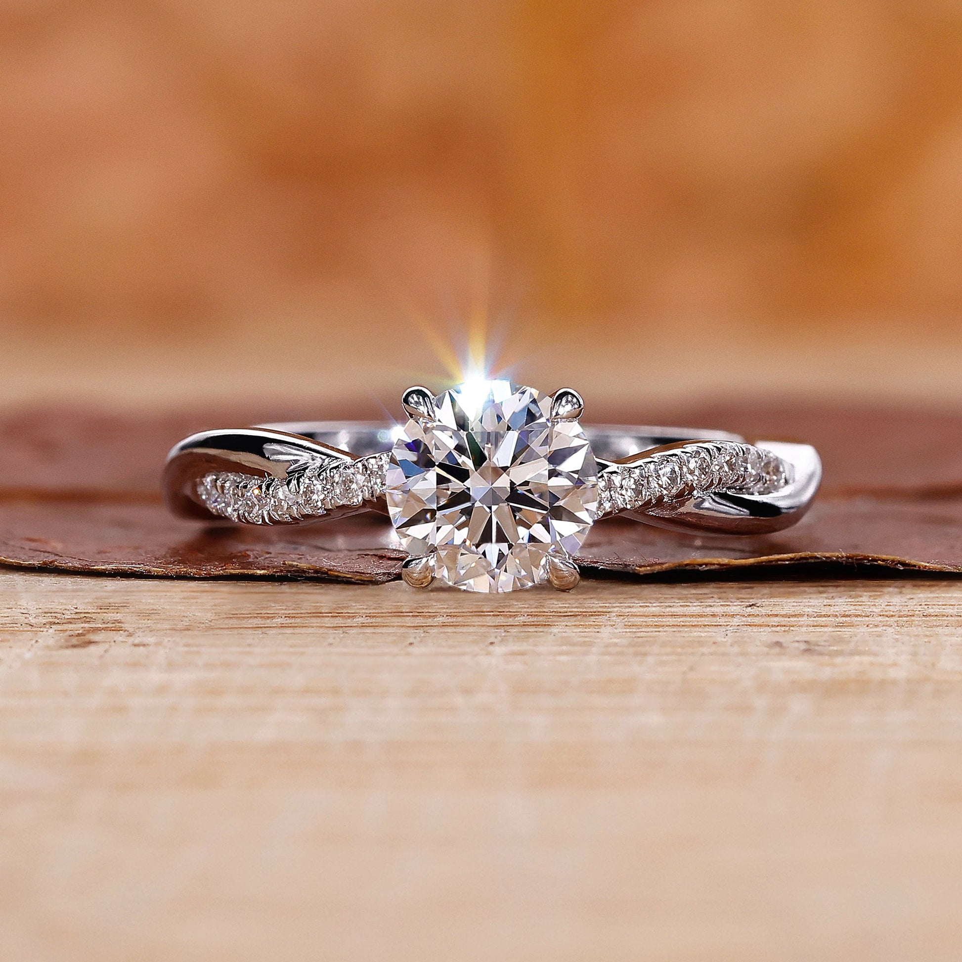 Close-Up of Round Diamond Engagement Ring with Twisted Pave Band