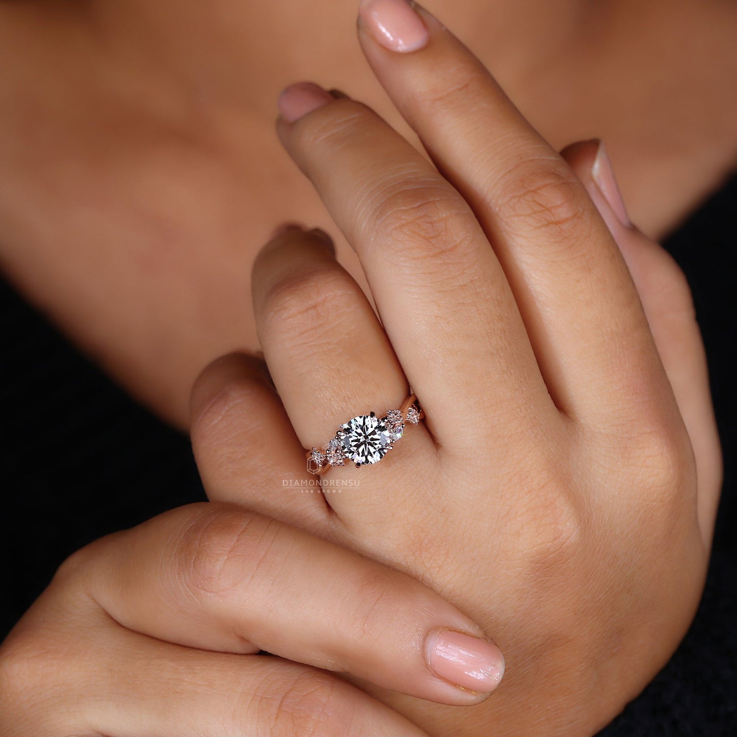 Diamondrensu round brilliant cut diamond ring with nature-inspired design and claw prongs.