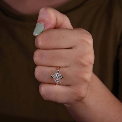 Three stone diamond ring worn by a model at a special event.