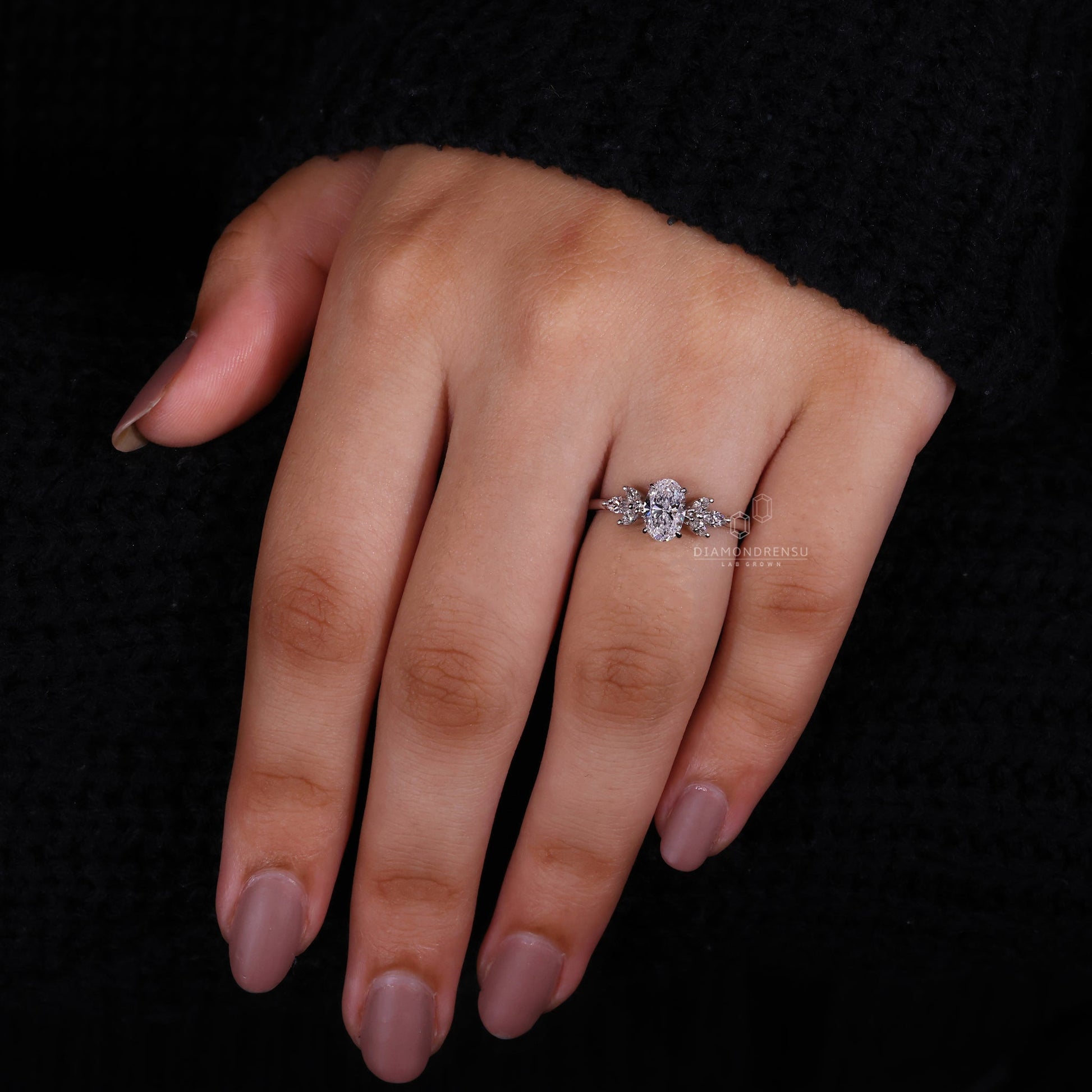 Lab-Grown Diamond Engagement Ring with Four Prongs on Model's Hand