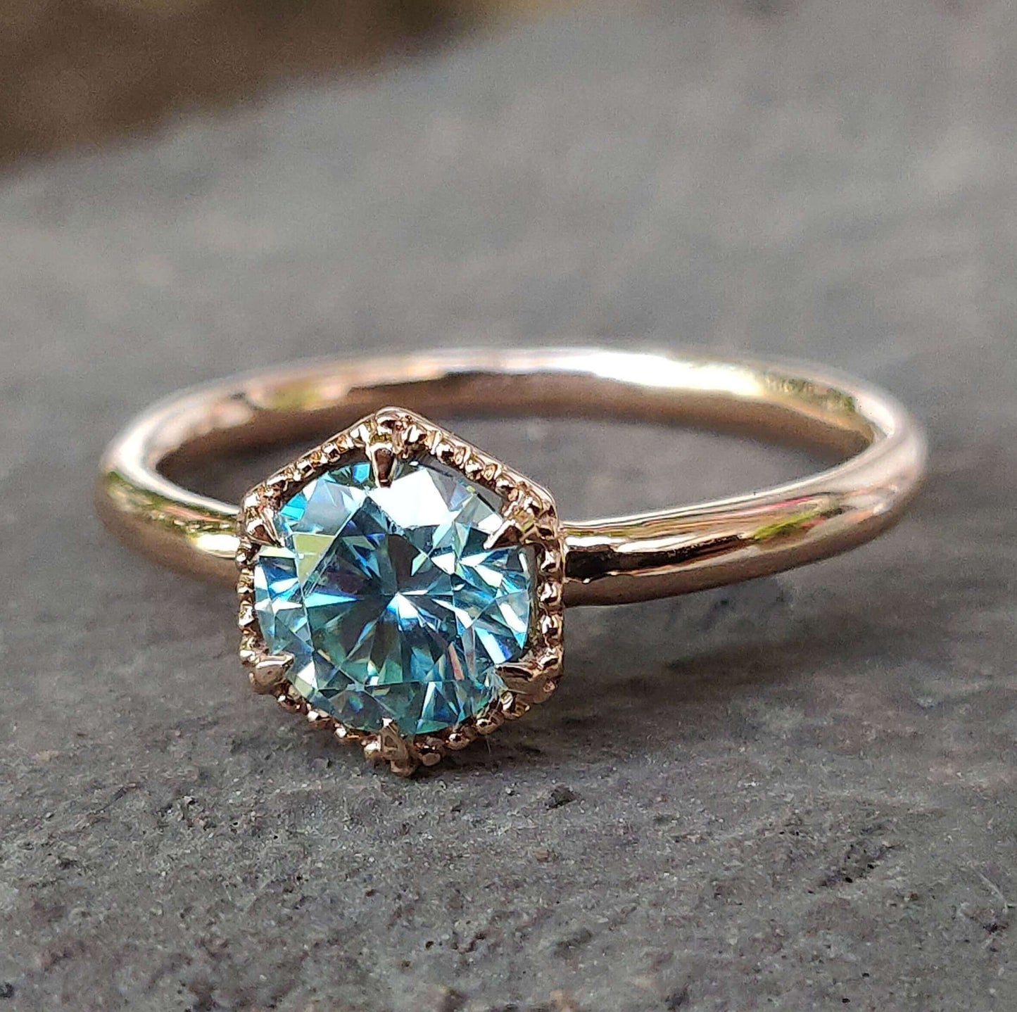 round cyan blue moissanite