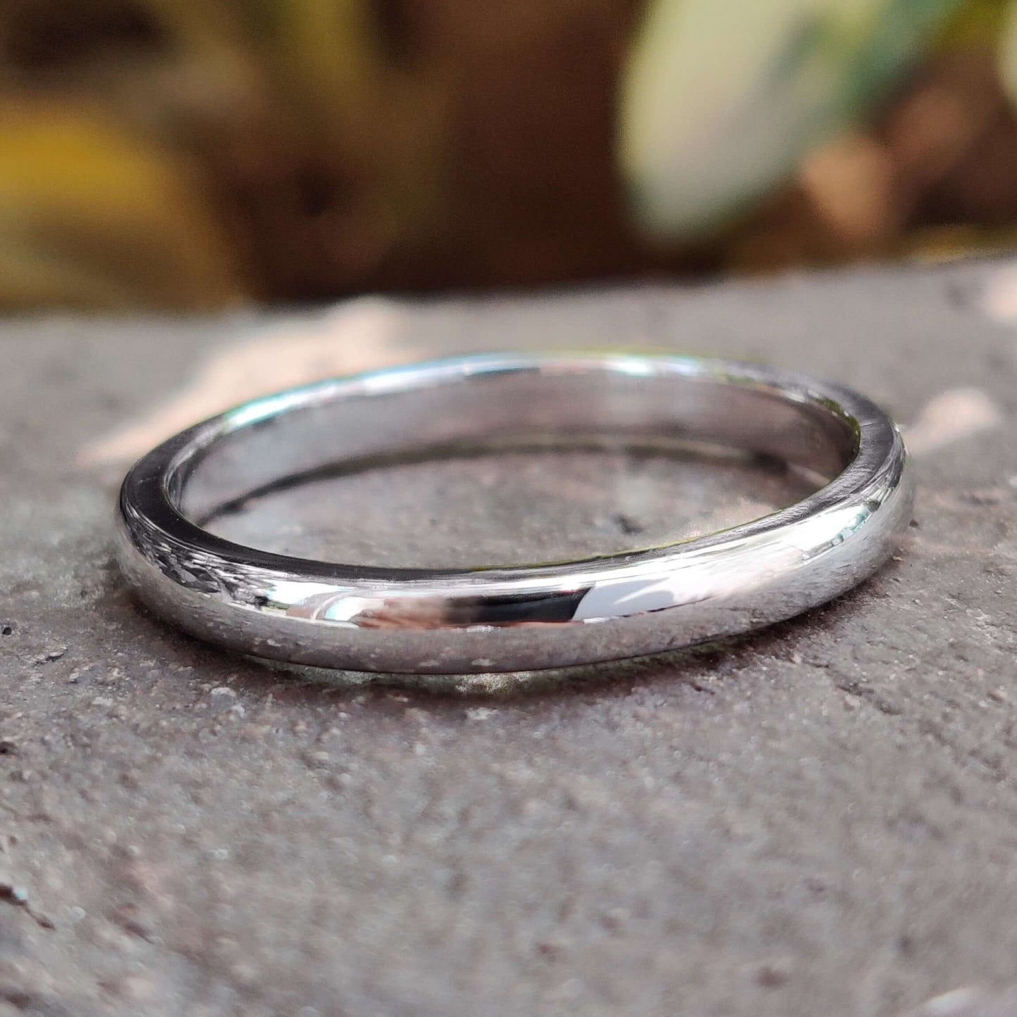 Elegant white gold wedding band with a timeless design.