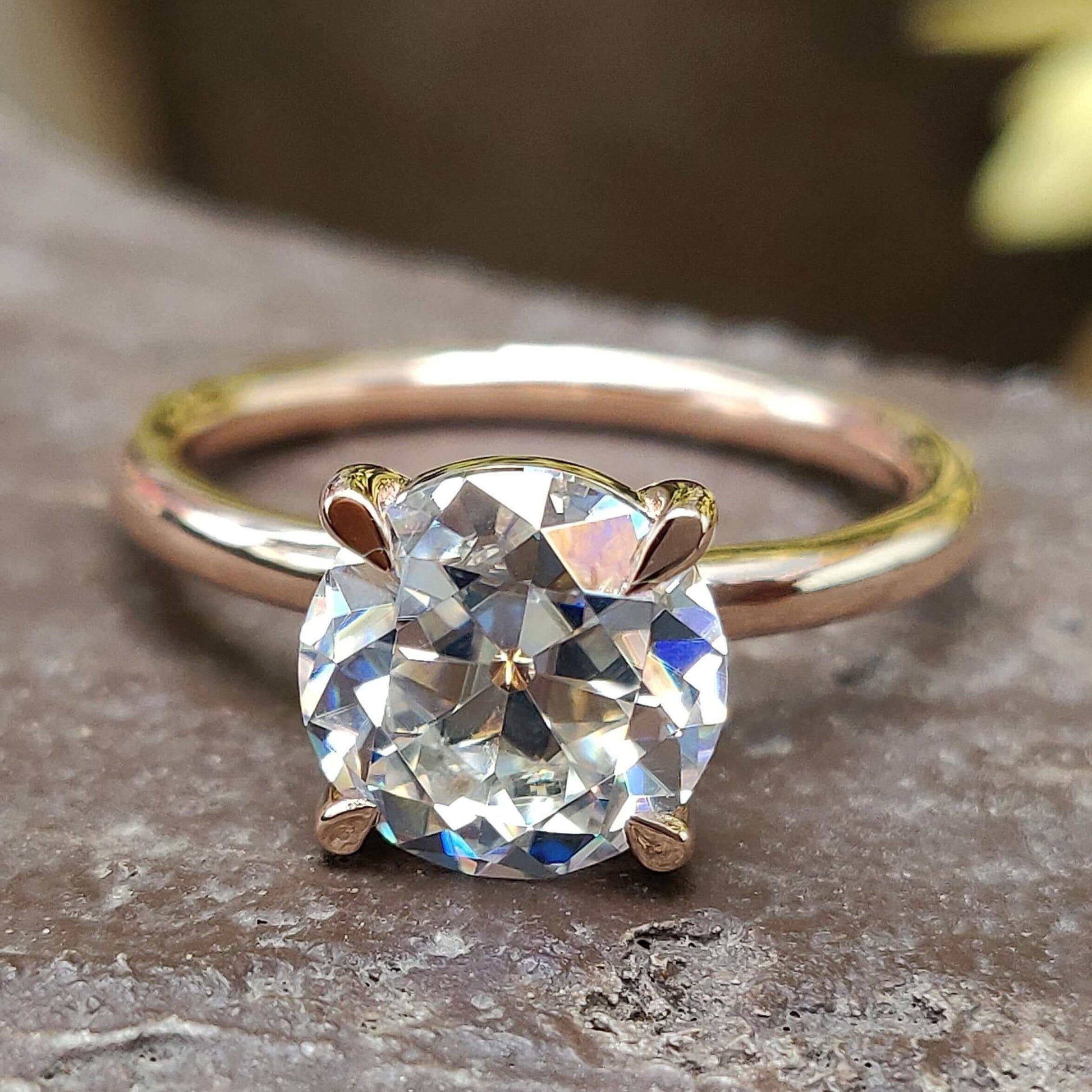 A stunning round solitaire engagement ring with a round brilliant cut diamond, showcasing timeless elegance and sophistication.
