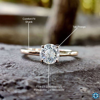 Handmade jewelry featuring a Portuguese cut engagement ring with a stunning ring setting prong for added security.