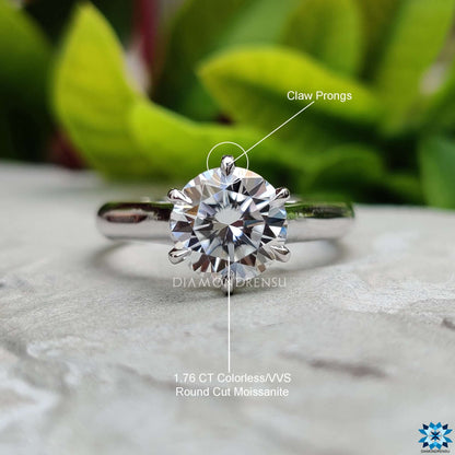 Impressive round brilliant cut stone set in a classic design, perfect for engagements.
