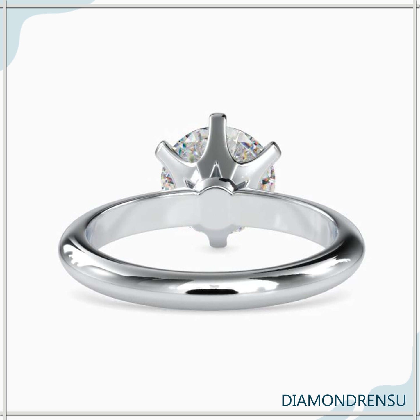 Round solitaire ring offering simplicity and timeless elegance.
