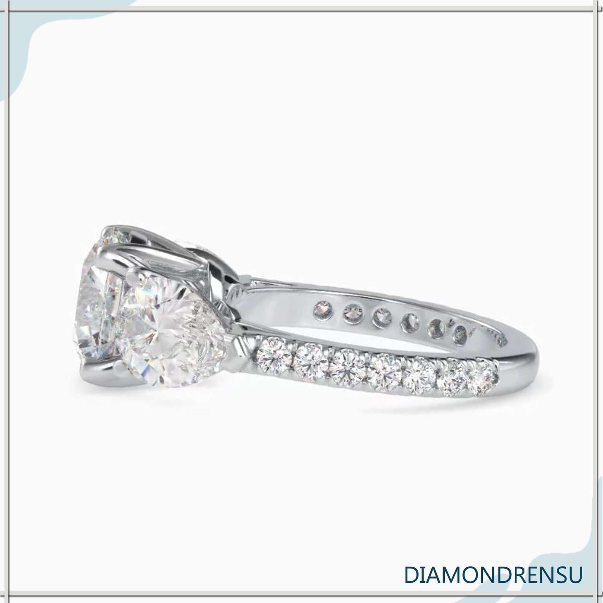 Handmade jewelry with pear and round diamonds for engagement