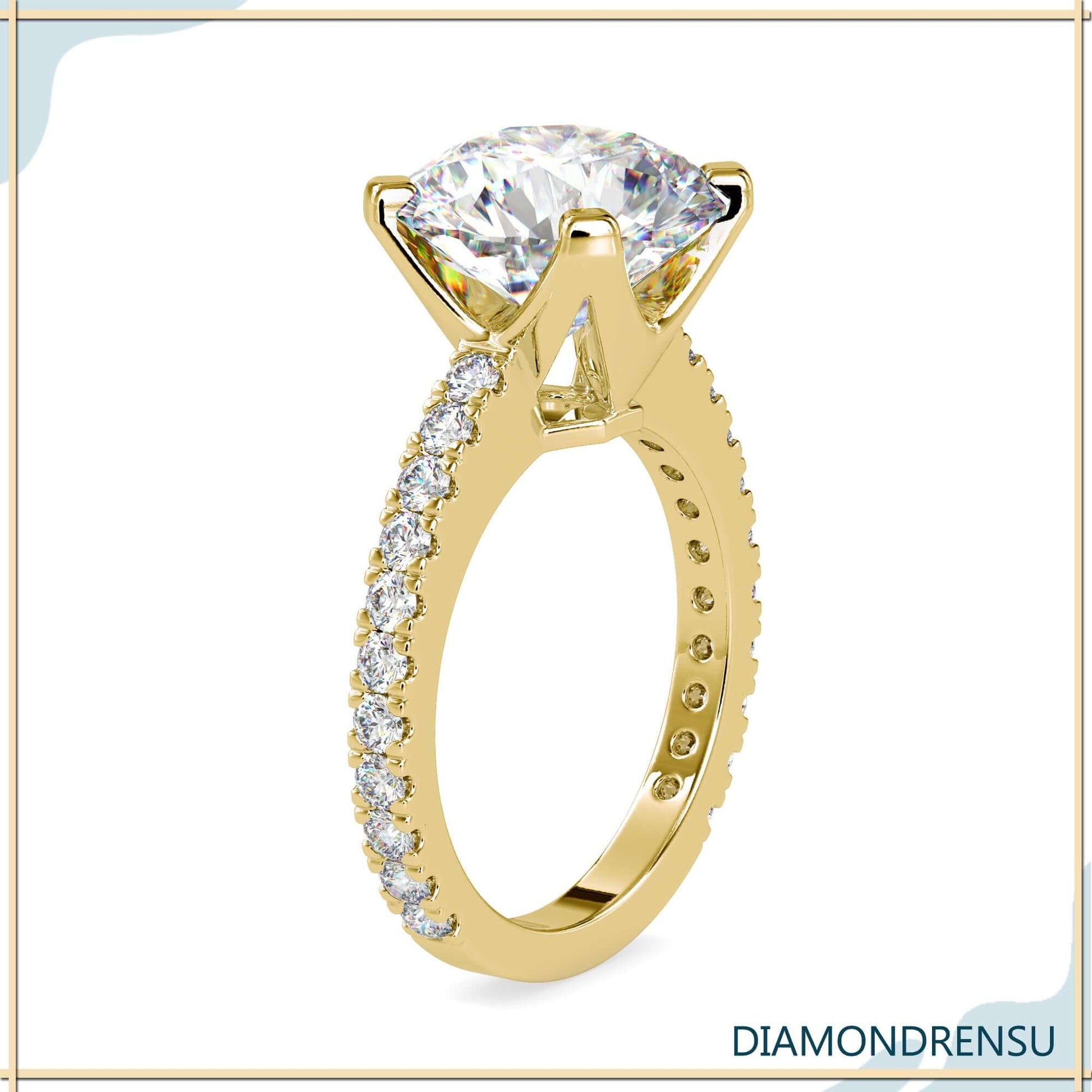 4 prong round engagement ring with prong tabs for secure diamond placement.
