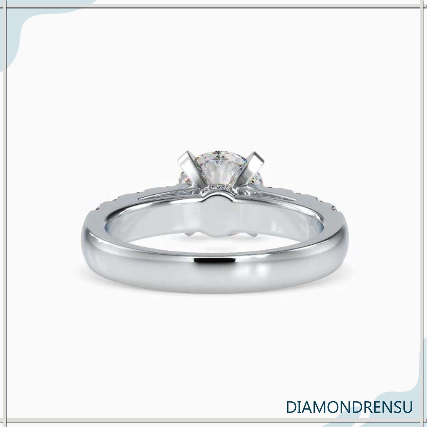 Handmade round cut engagement ring with a prong setting and Diamondrensu design.
