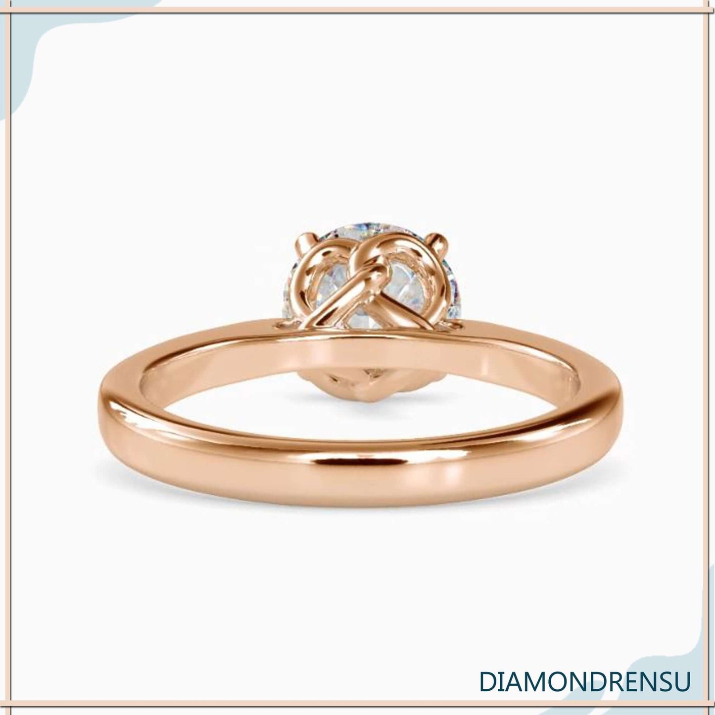 Timeless rose gold engagement solitaire ring with a twisted prong design for extra shine.