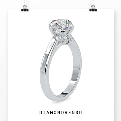 Bridge engagement ring with elegant diamond accents.