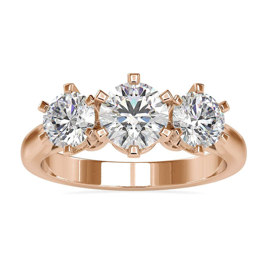 Three stone diamond ring with round brilliant cut diamonds in a cathedral setting