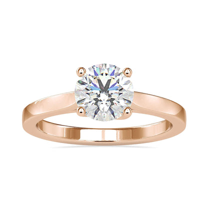 Round solitaire ring in rose gold, white gold, or yellow gold.
