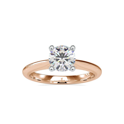 Cathedral engagement ring with a round cut diamond, crafted by hand using ethically sourced lab-grown diamonds.
