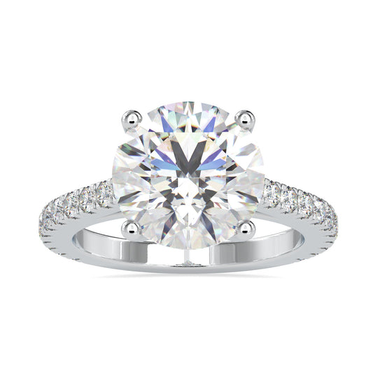 Round diamond engagement ring with a cathedral setting and 2 carat round diamond.
