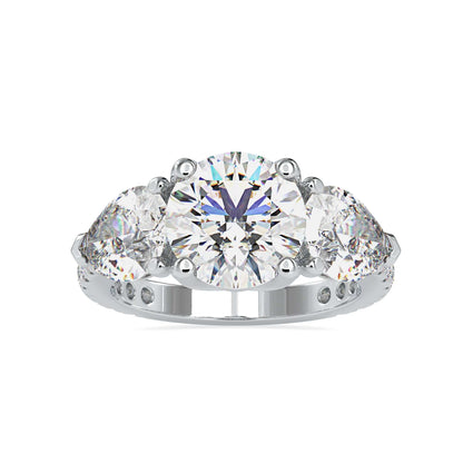 Cathedral setting ring with pear shaped diamonds and side stones