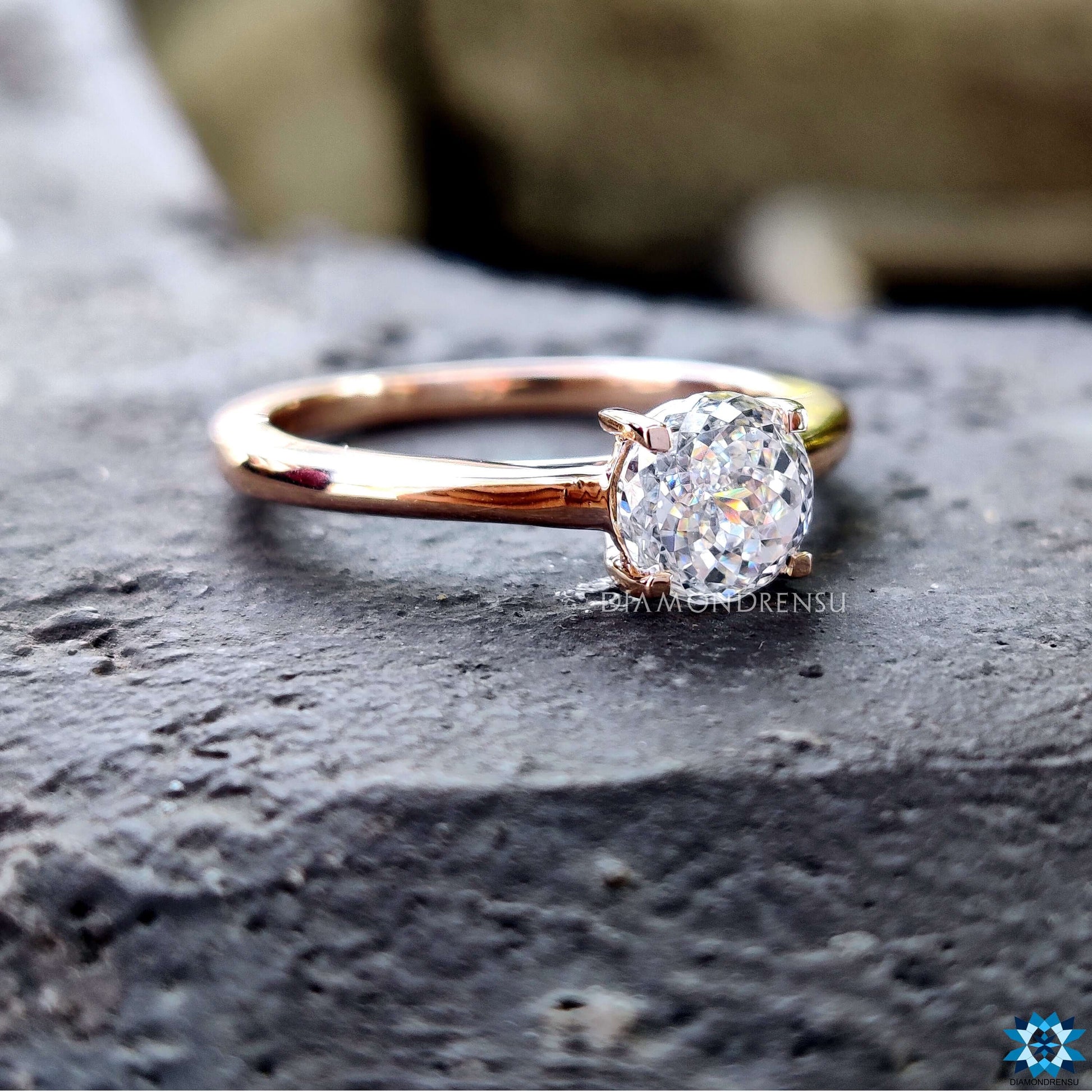 Handcrafted Portuguese cut ring featuring a diamondrensu engagement ring style in luxurious rose gold.