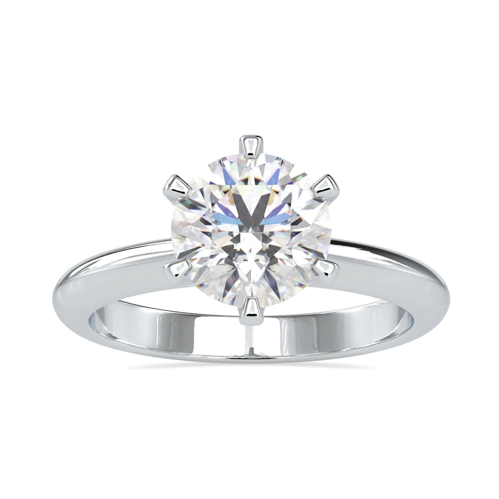 Round solitaire ring offering simplicity and timeless elegance.
