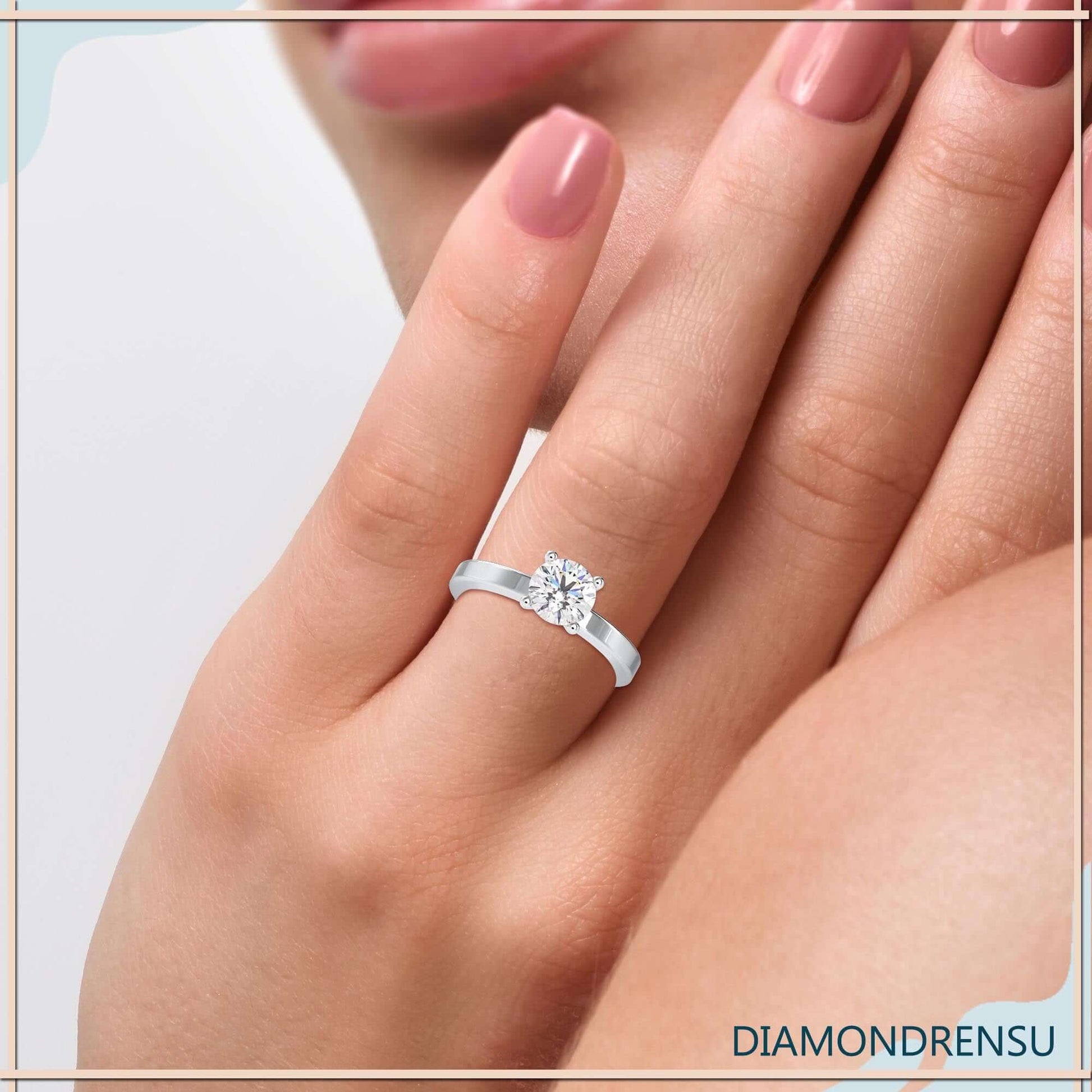 Elegant diamond solitaire ring round featuring a secure basket setting.