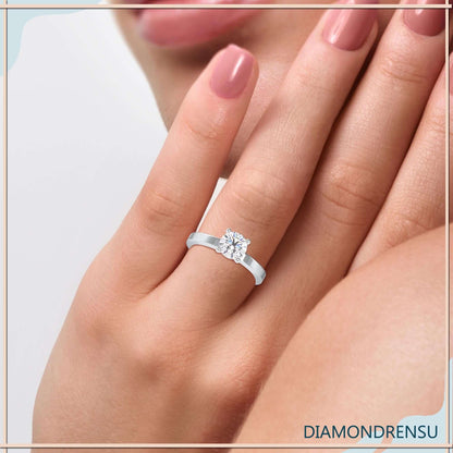 Elegant diamond solitaire ring round featuring a secure basket setting.