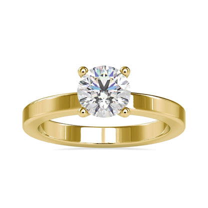 Simple solitaire engagement ring featuring a round lab grown diamond in a classic design.