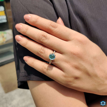 cyan blue moissanite engagement ring