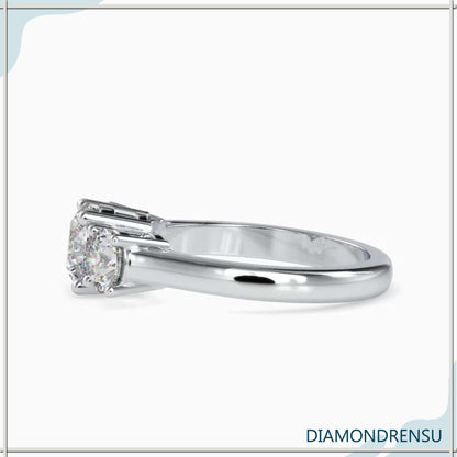 3 stone engagement ring with round diamonds, crafted in white gold
